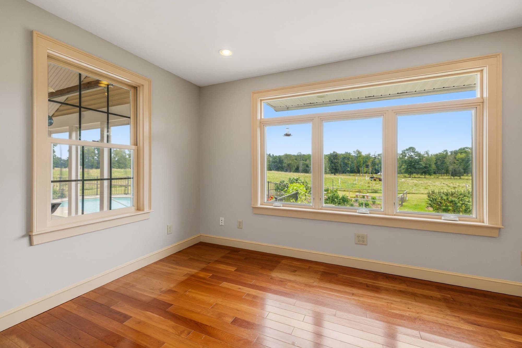 The office with a wide window over the back fields
